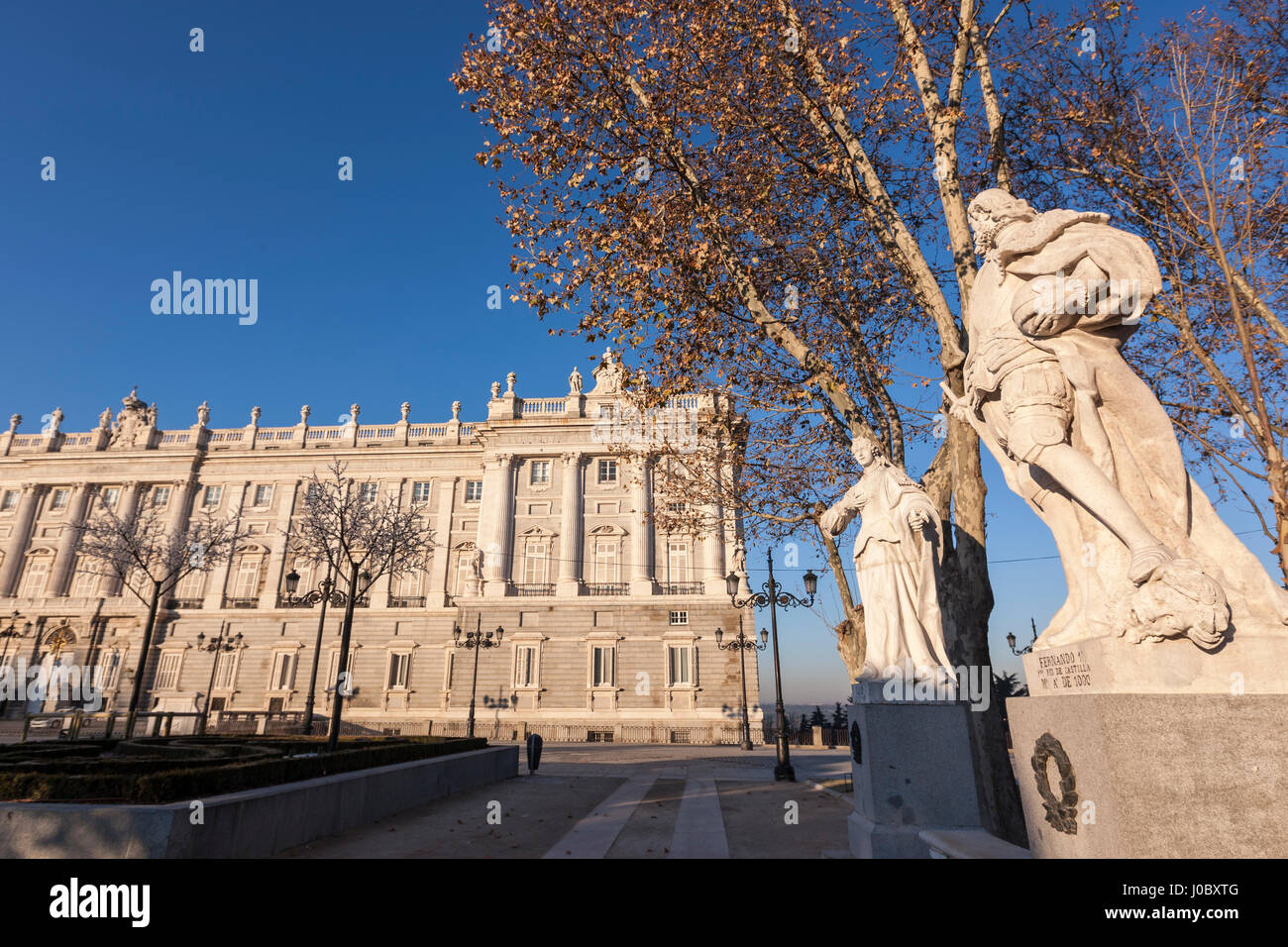 Statues in Plaza de Oriente with Palacio Real de Madrid, Royal Palace of Madrid, Calle de Bailén Statues in Plaza de Oriente with Palacio Real de Madrid, Royal Palace of Madrid, Calle de Bailén