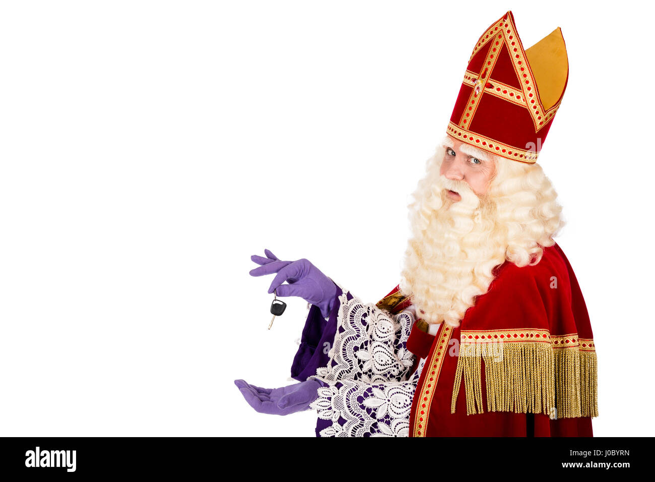 Sinterklaaswith Car Key. isolated on white background. Dutch character of St. Nicholas and Black Pete Stock Photo