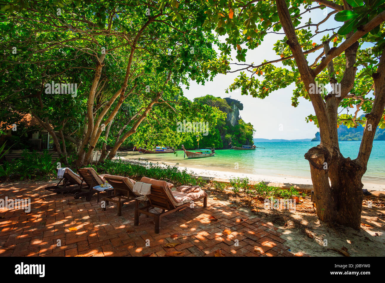 Quiet place with beach chairs to enjoy the view at Railay beach, Ao Nang, Thailand Stock Photo