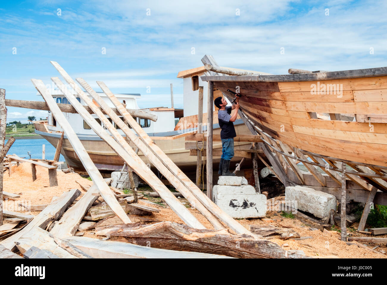 A boat-builder on Chiloe island, Northern Patagonia, Chile Stock Photo