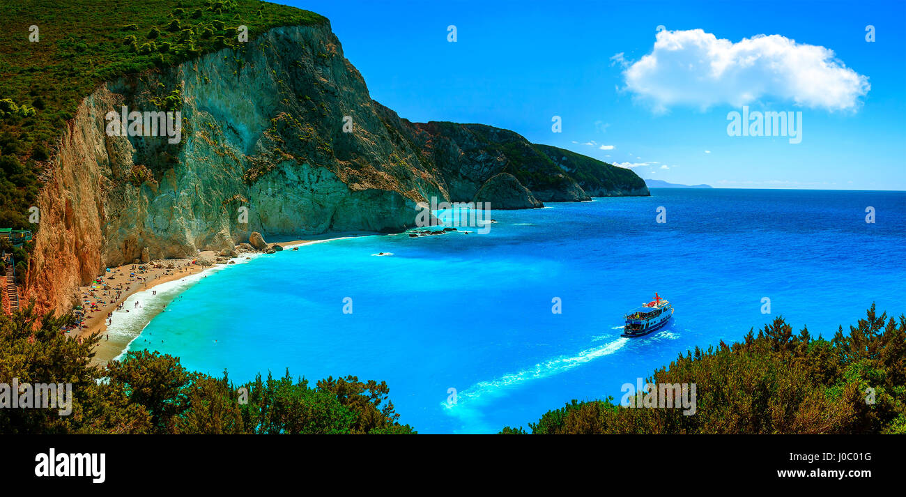 Ship with tourists leaving Porto Katsiki beach in Lefkada, Greece Stock Photo