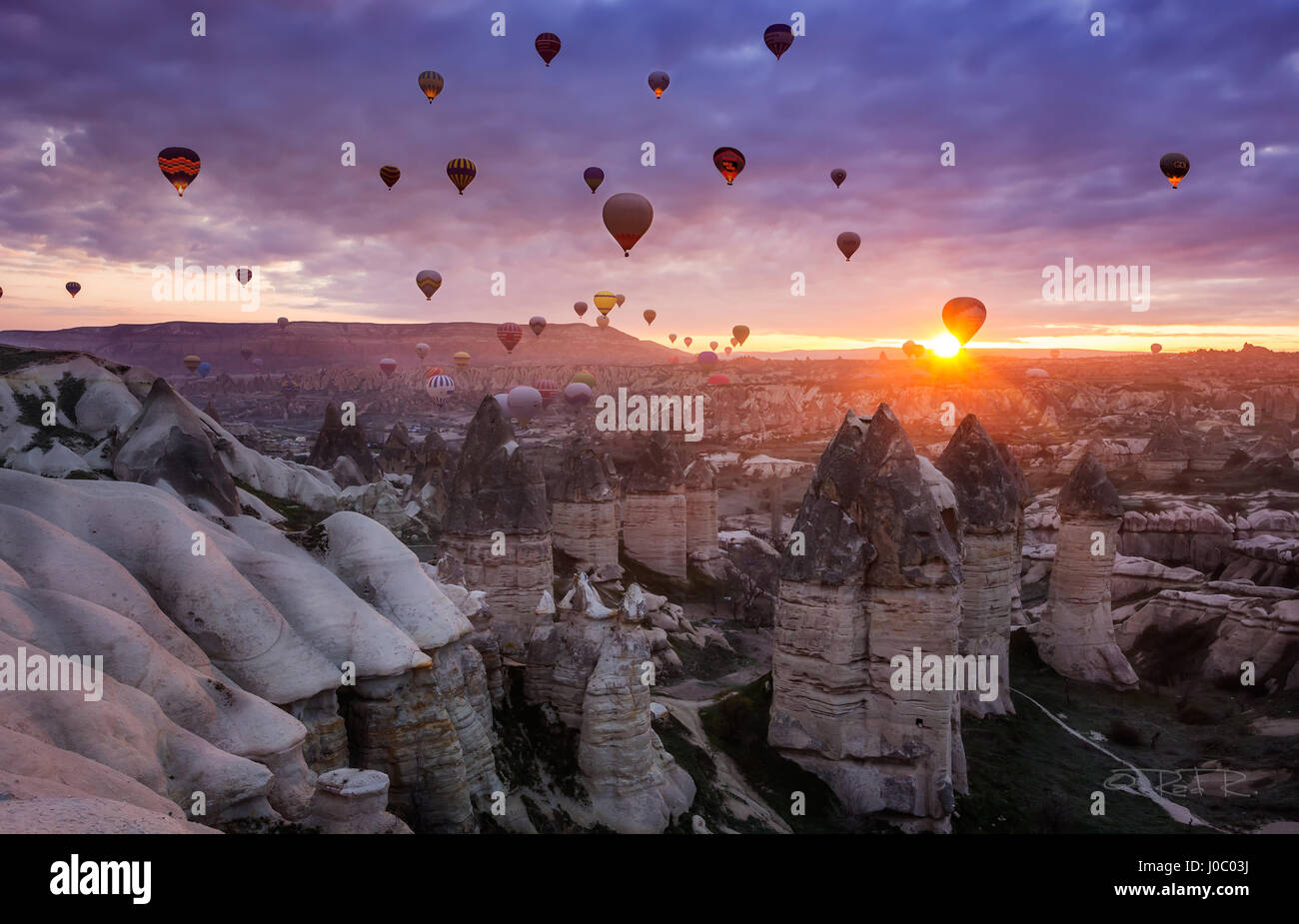 Hot air balloons at sunrise in Cappadocia, Turkey Stock Photo