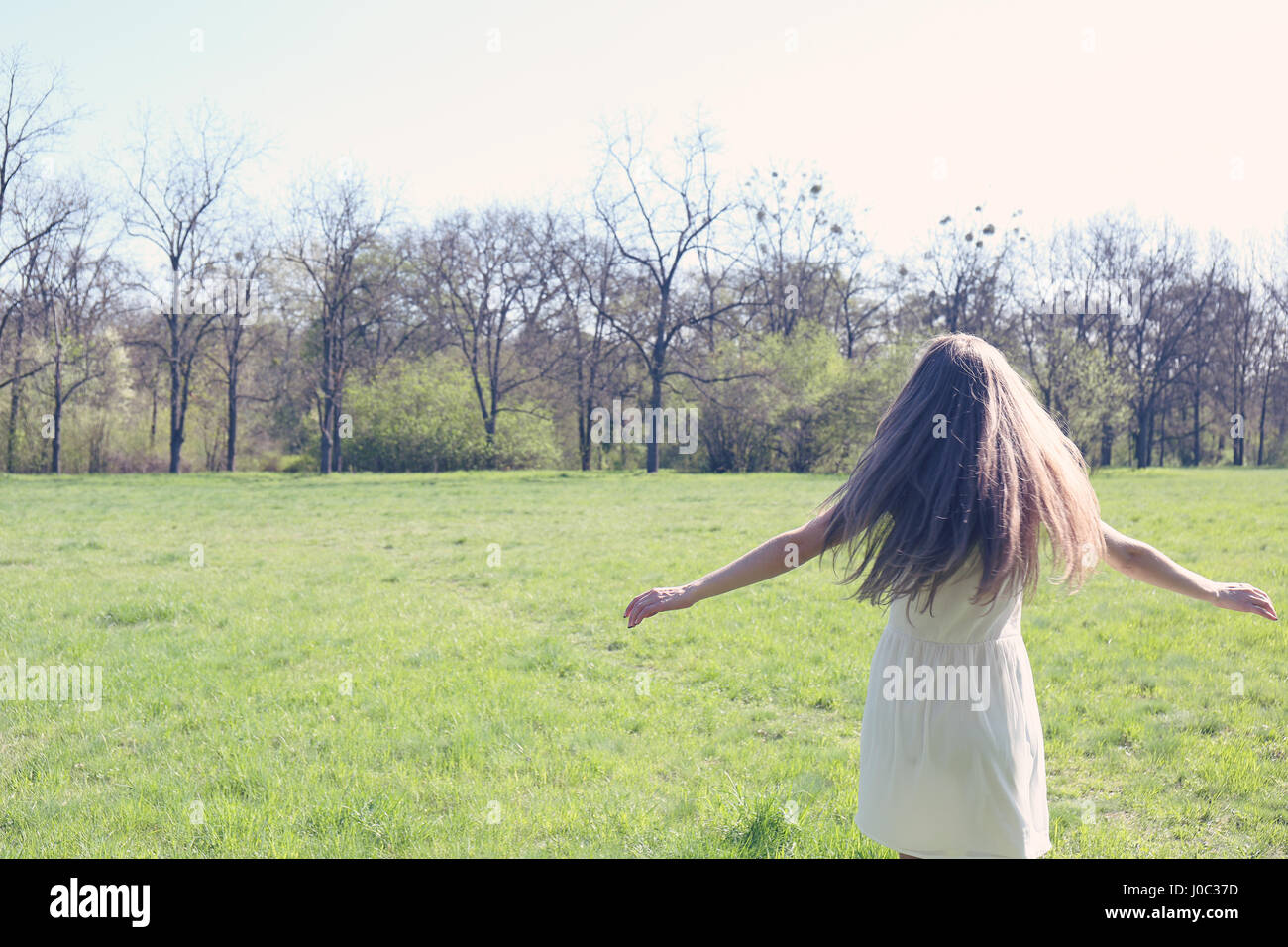 girl running on meadow Stock Photo - Alamy