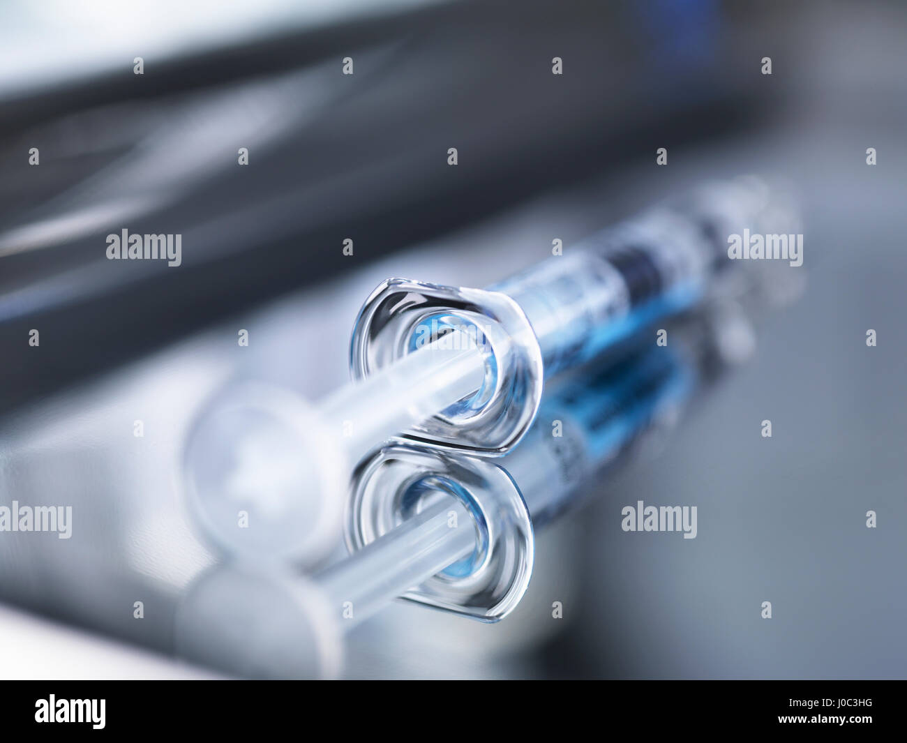 Syringe on surgical tray ready for use, close-up Stock Photo