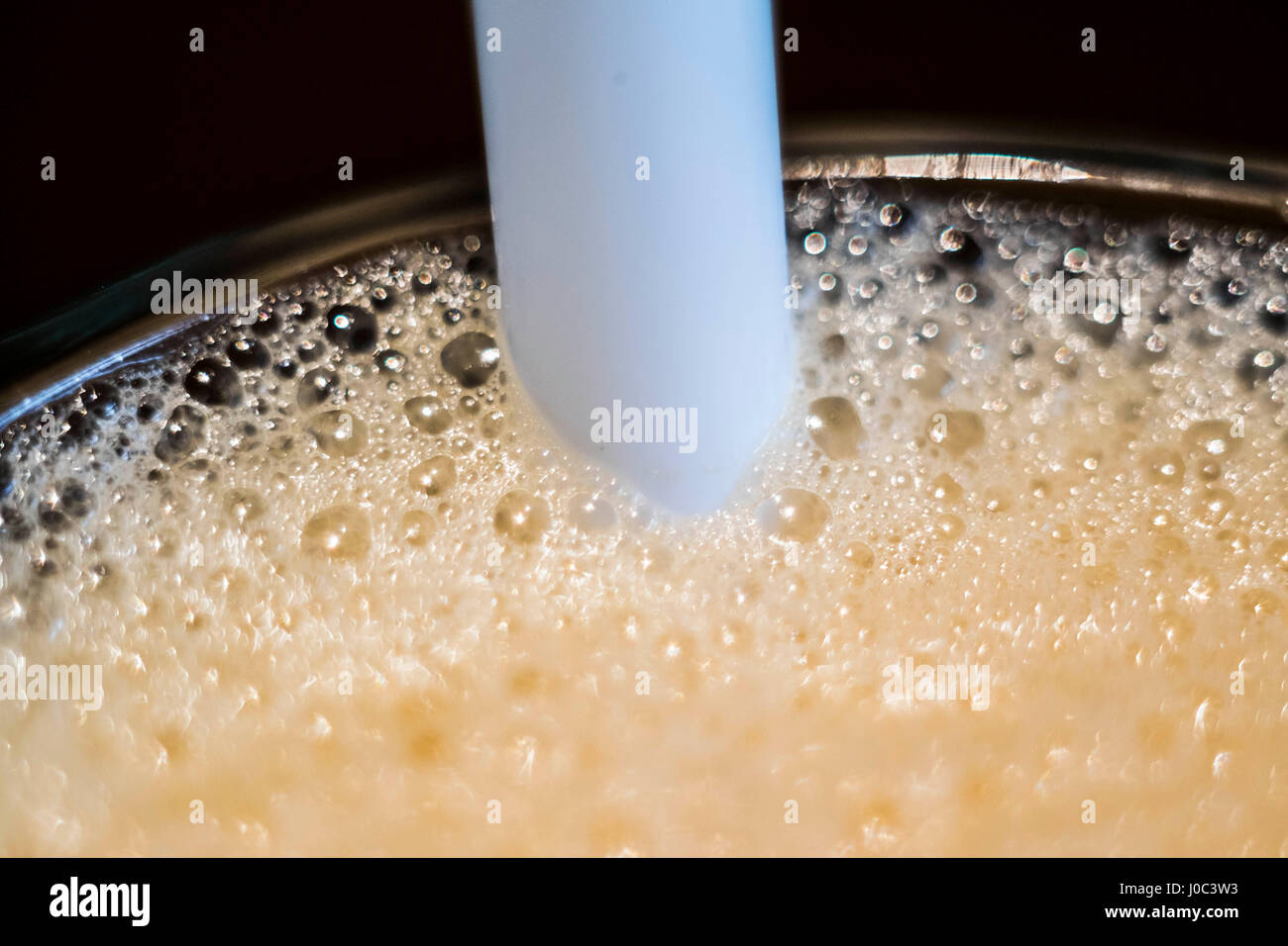 A series of twelve close up macro photos detailing making Bubble Tea or Boba Tea. Taiwan is the birthplace of the phenomenon that is Bubble Tea. Stock Photo