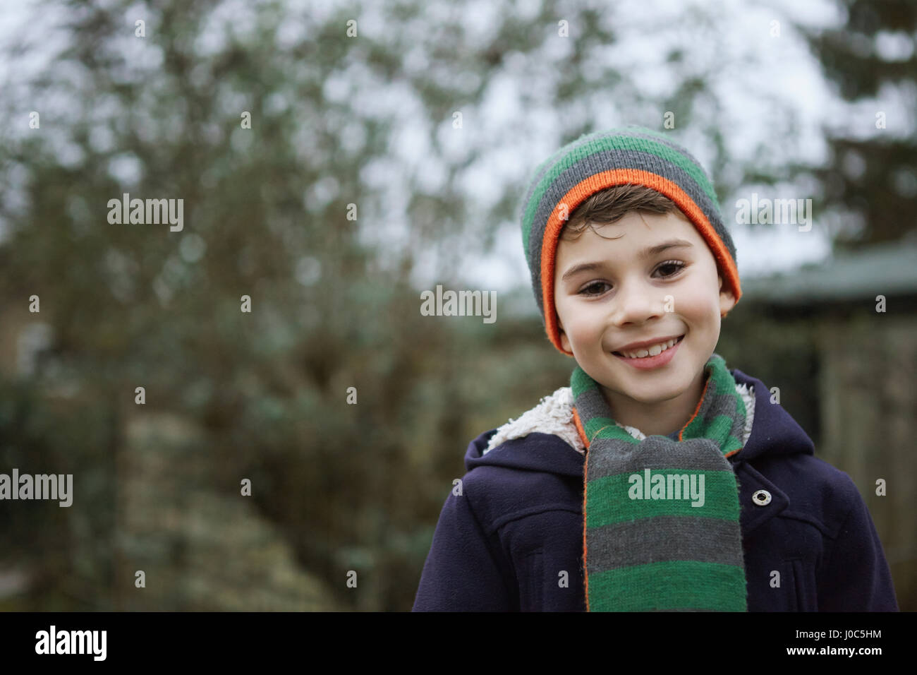 Portrait of boy in knit hat outdoors Stock Photo