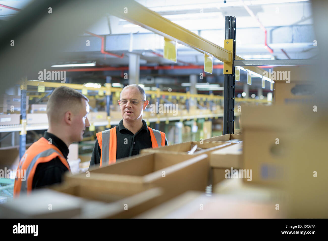 Factory supervisor talking hires stock photography and images Alamy