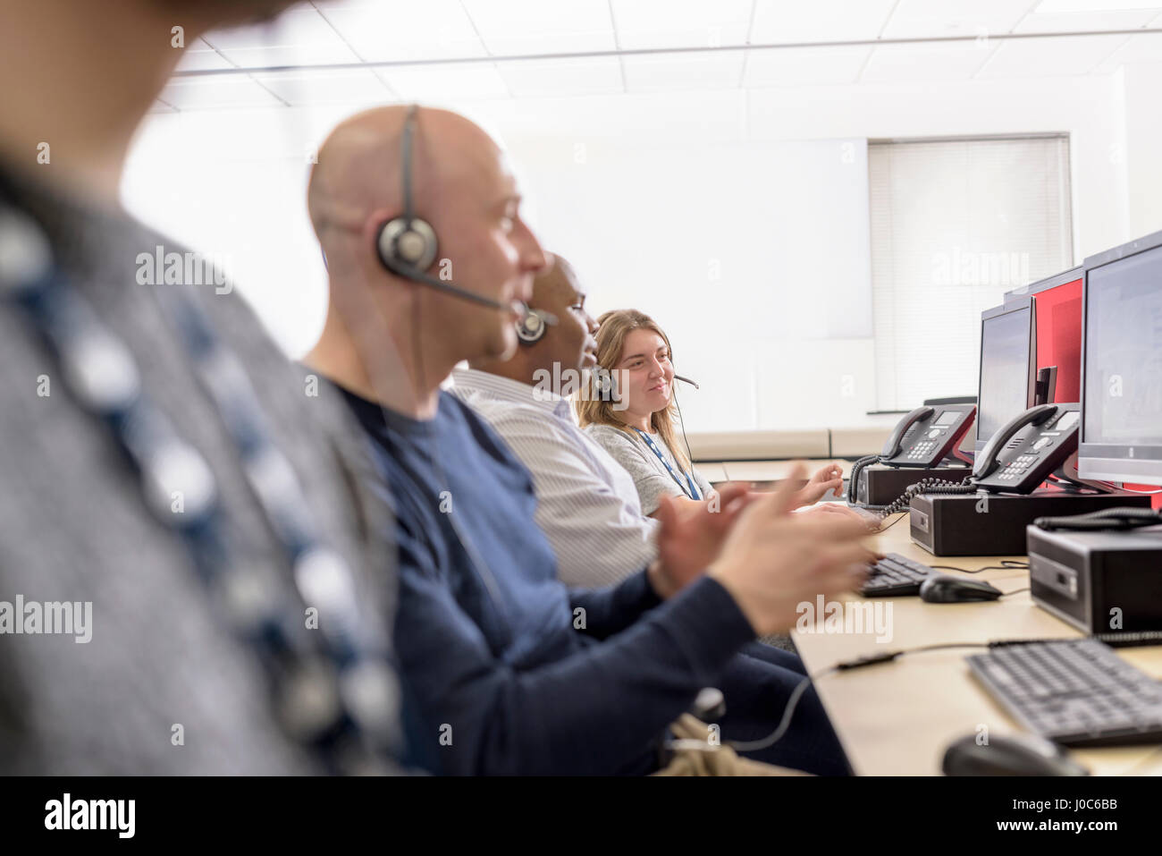 Operators in automotive call centre in car factory Stock Photo