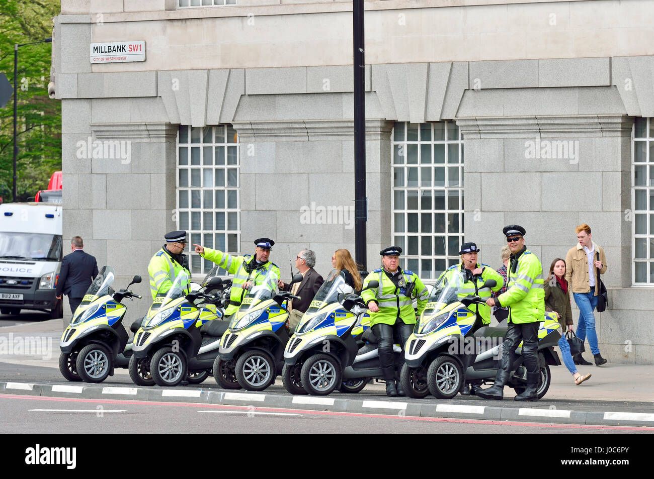 London, England, UK. Metropolitan Police Piaggio MP3 scooters parked on  Millbank Stock Photo - Alamy
