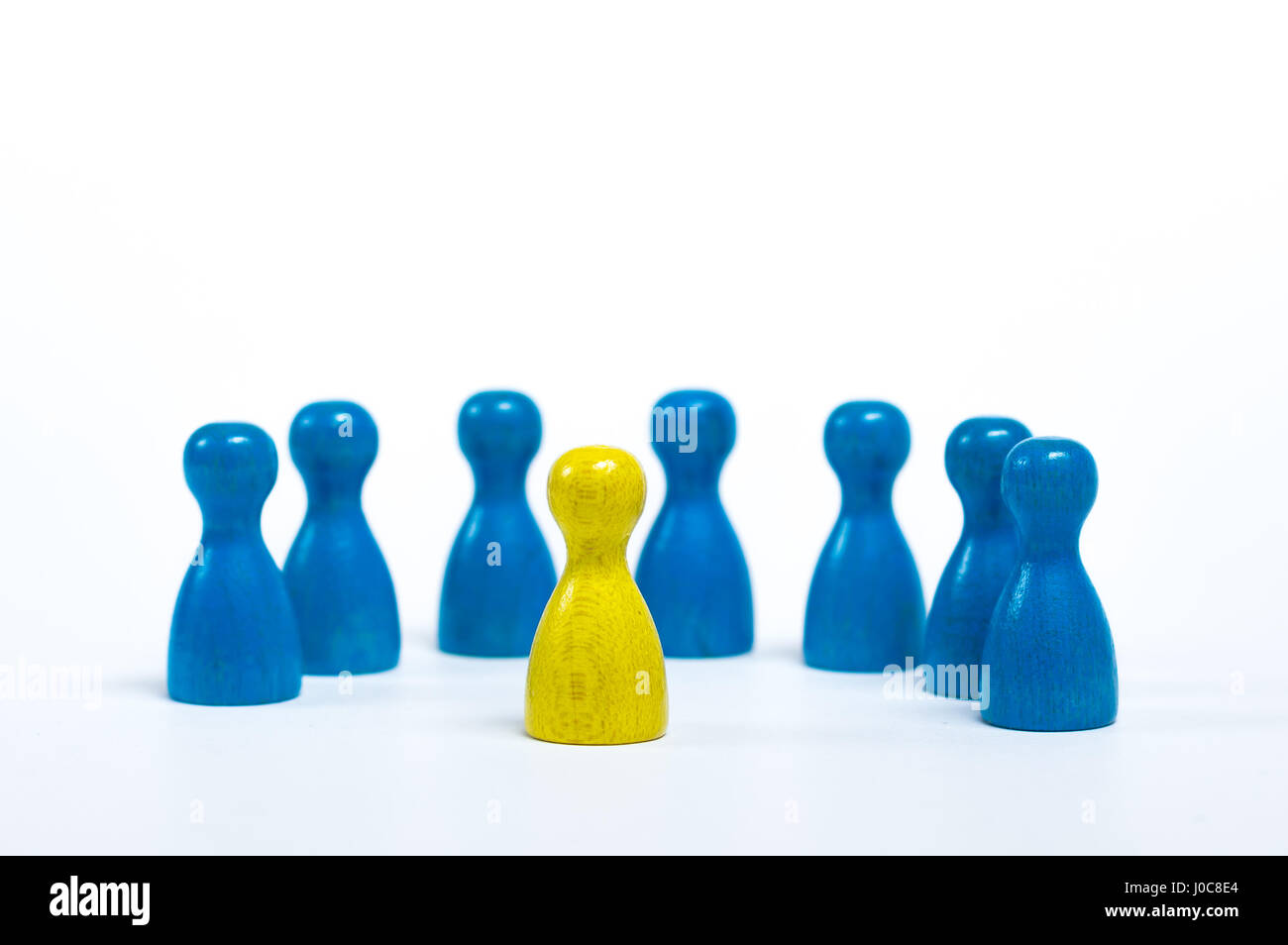 Board game pieces in front of white background - Concept of leadership Stock Photo