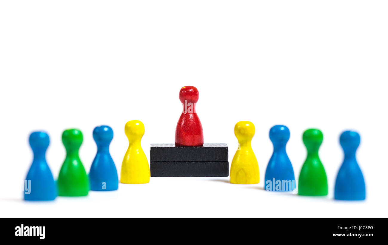 People are lining up in front of a dominant person Stock Photo Alamy