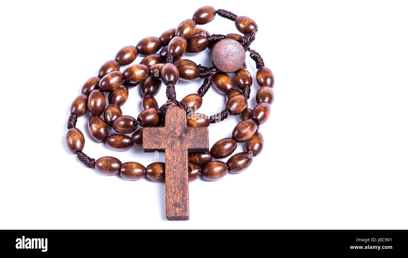 Wooden chaplet in front of white background Stock Photo