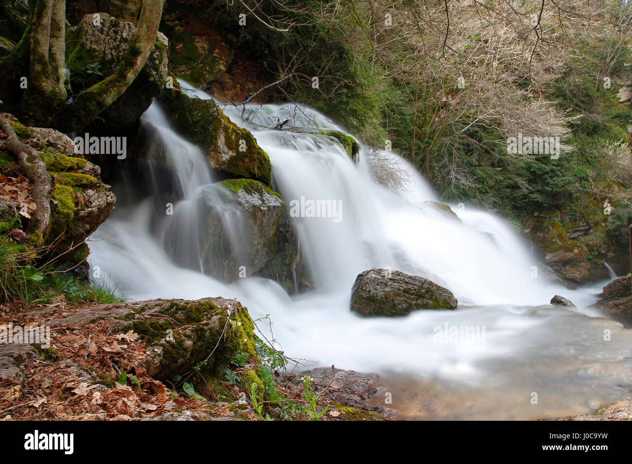 Waterfall in a river, in a long exposure shot Stock Photo