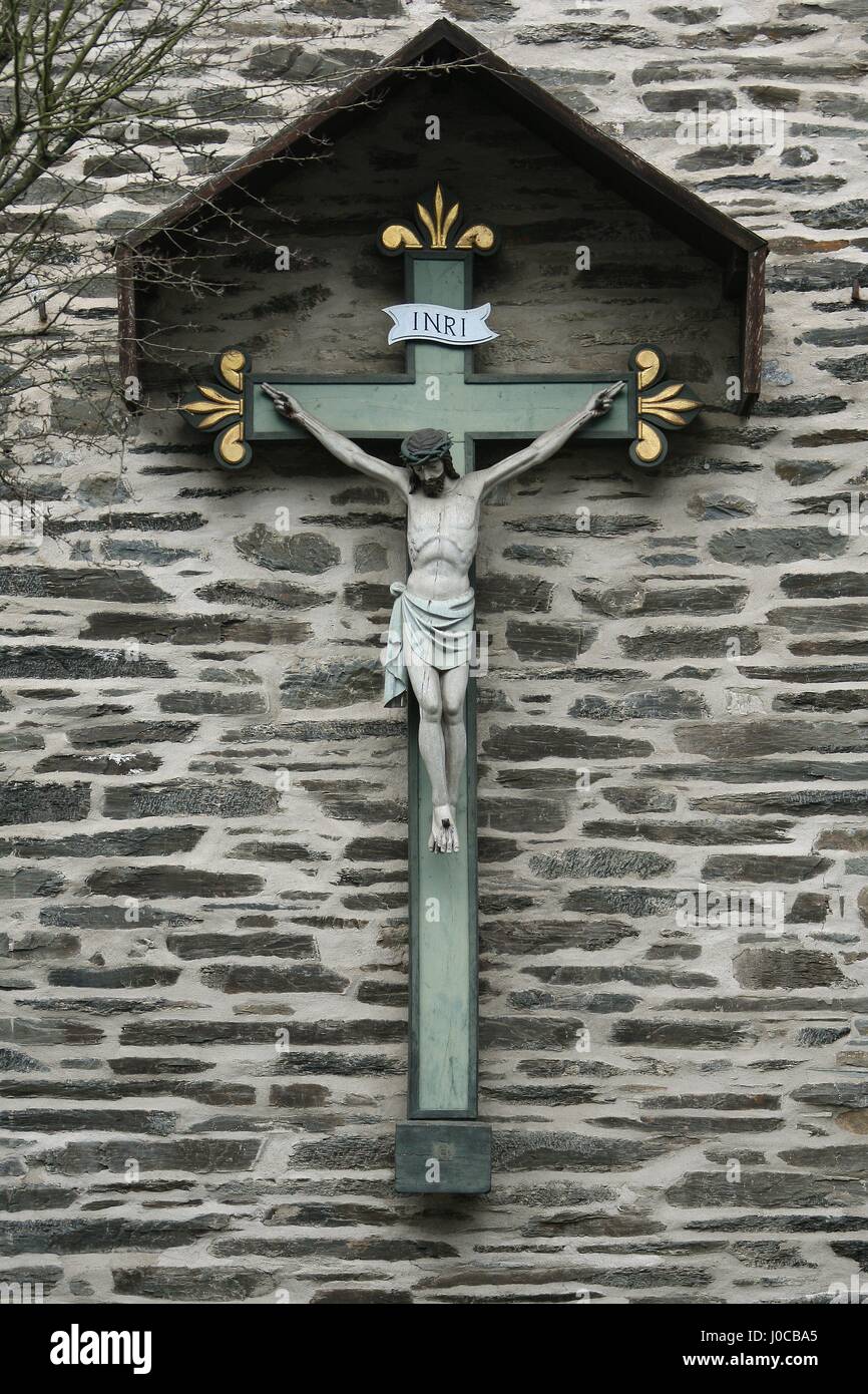 Religious cross outside a church in the market town of Monschau North Rhine-Westphalia Germany EU 2016 Stock Photo