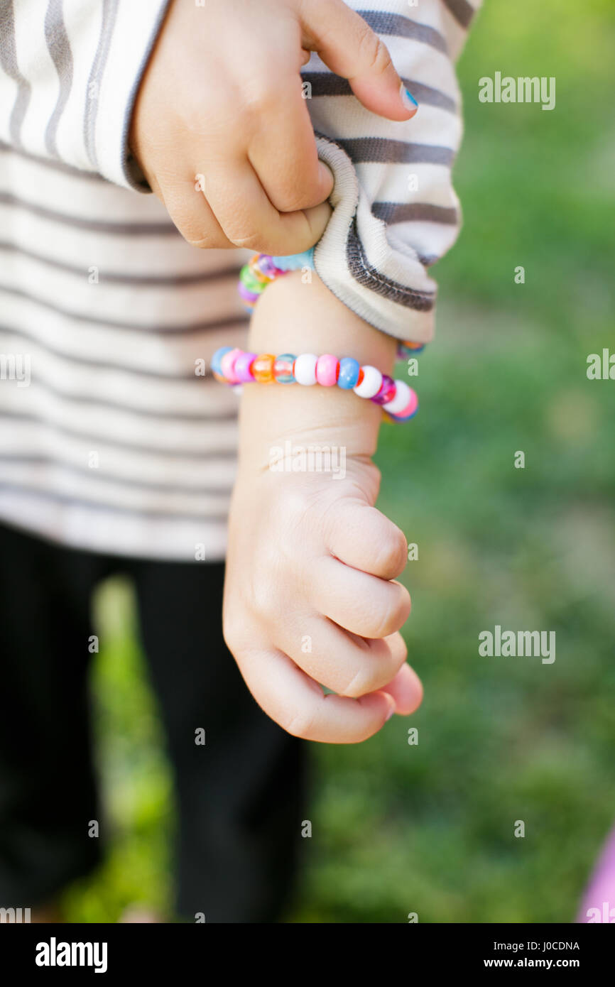 Making Bracelets Stock Photo - Download Image Now - Making, Bracelet, Girls  - iStock