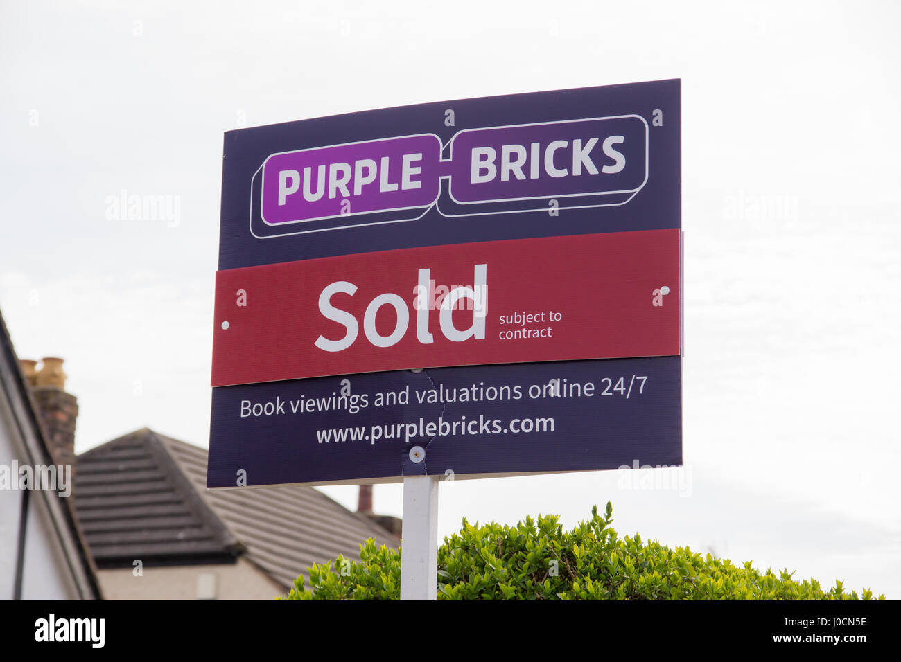 Purple Bricks Group PLC estate agents sold sign the company is the UKs first online property agent launched in 2014 Stock Photo