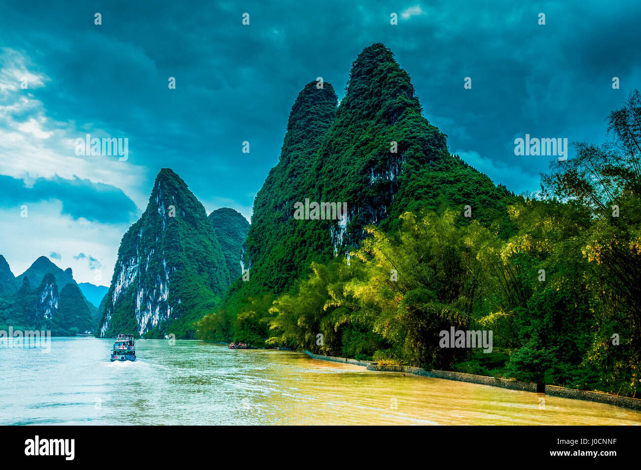 Karst mountains and Lijiang River scenery in the mist Stock Photo