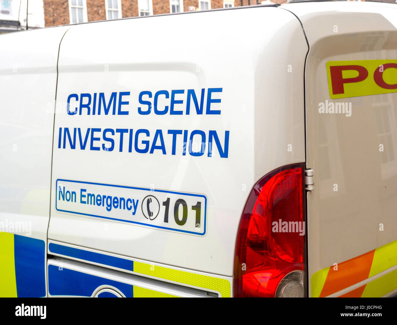 Police van labeled Crime Scene Investigation Non Emergency 101 Stock