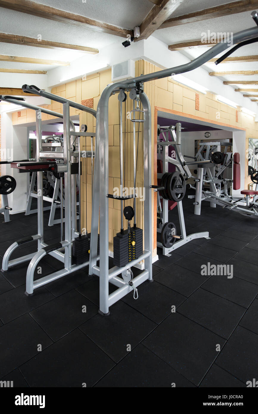 Modern Gym Room Fitness Center With Equipment And Machines Stock Photo ...