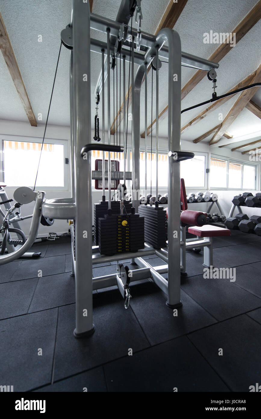 Modern Gym Room Fitness Center With Equipment And Machines Stock Photo ...