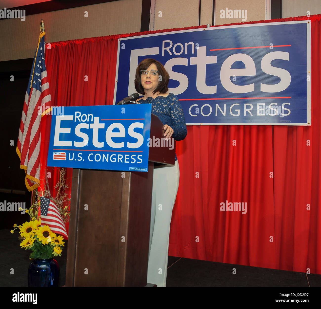 Wichita, U.S. 11th Apr, 2017. Susan Estes introduces her husband Ron to the crowd of supporters at the victory celebration after his win of the special election, Wichita Kansas, April 11, 2017. Credit: mark reinstein/Alamy Live News Stock Photo