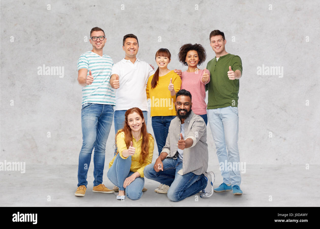 international group of people showing thumbs up Stock Photo - Alamy
