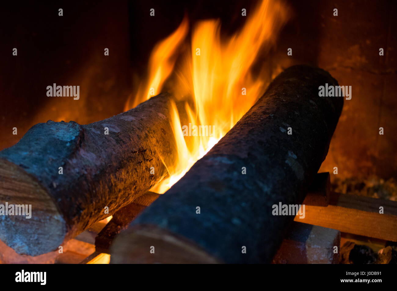 fire and wood burning in a fireplace. Closeup image, Fire and Flame in the stove Stock Photo