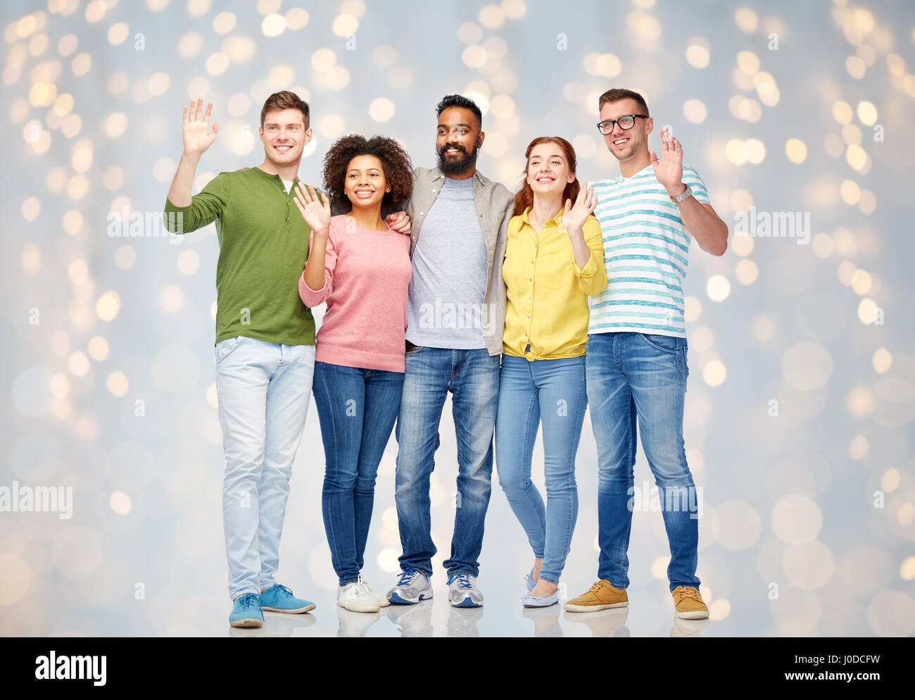 international group of happy people waving hands Stock Photo - Alamy