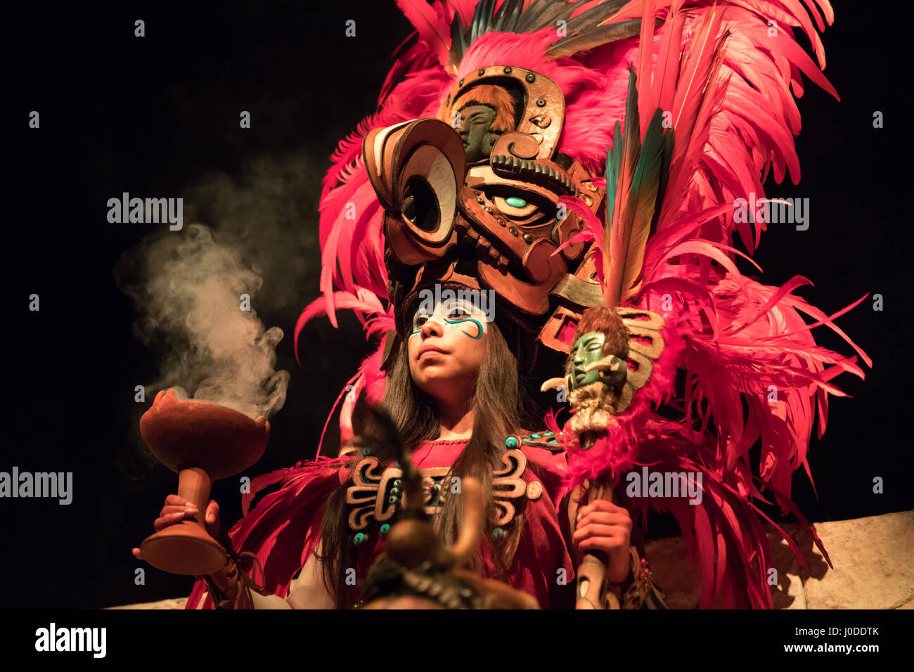Cancun, Mexico - Mar 16, 2017: Young woman in a dramatic Mayan costume. Stock Photo