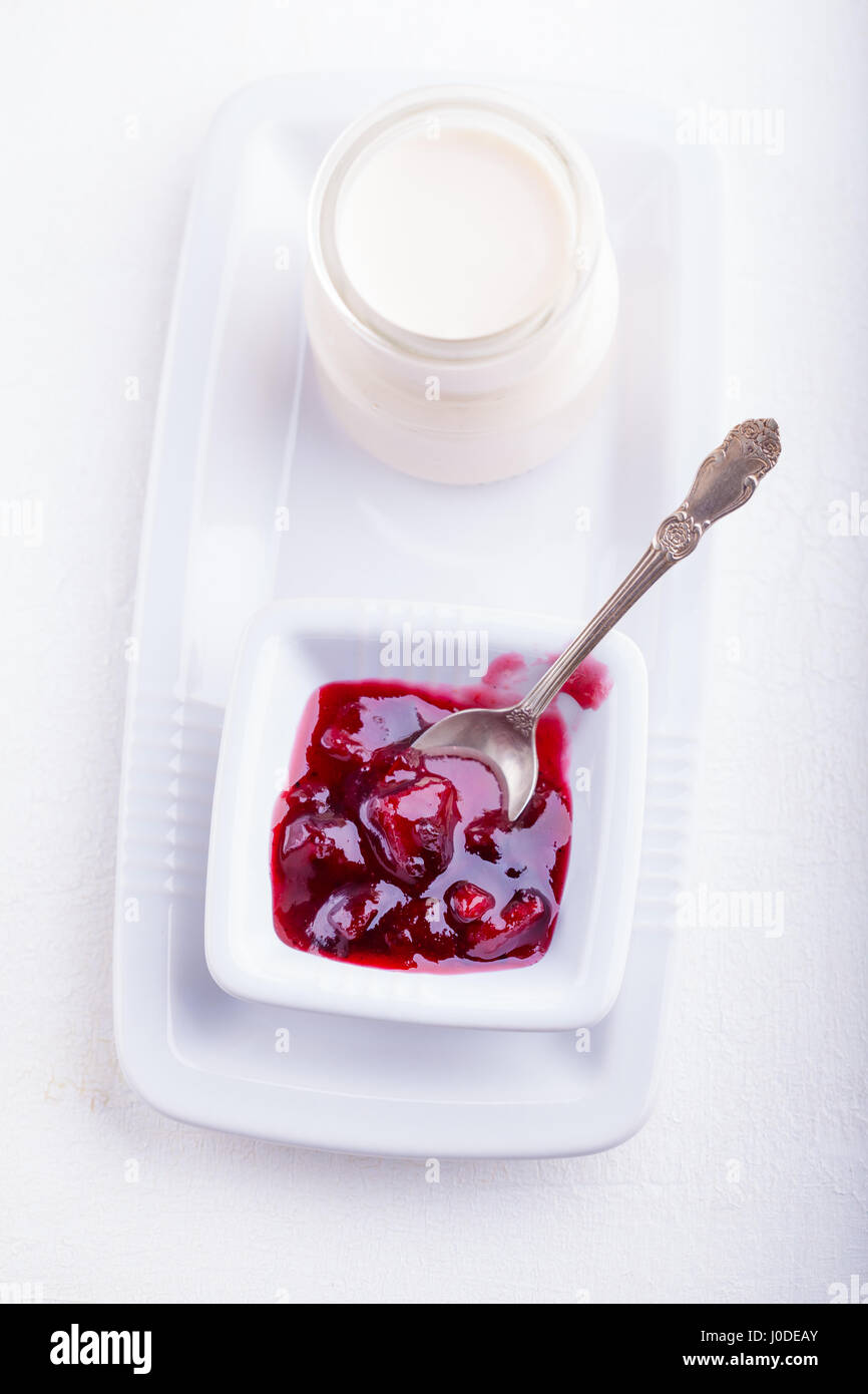 Yogurt and plum jam Stock Photo Alamy