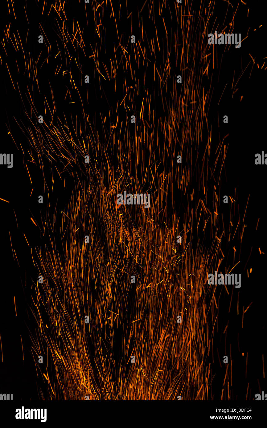 bonfire spark in the dark sky in night Stock Photo - Alamy