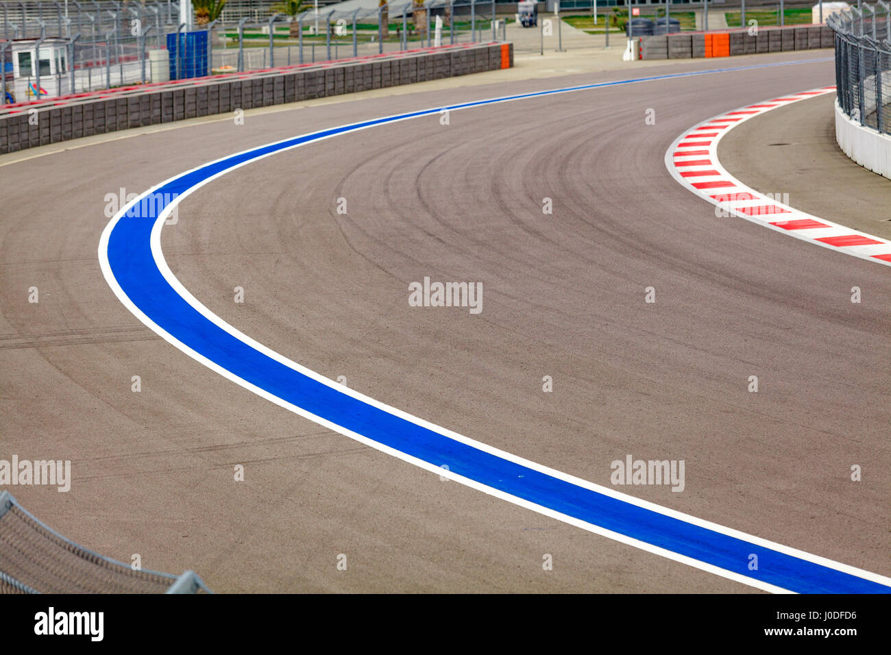 Motor racing track. Turning asphalt road with marking lines Stock Photo