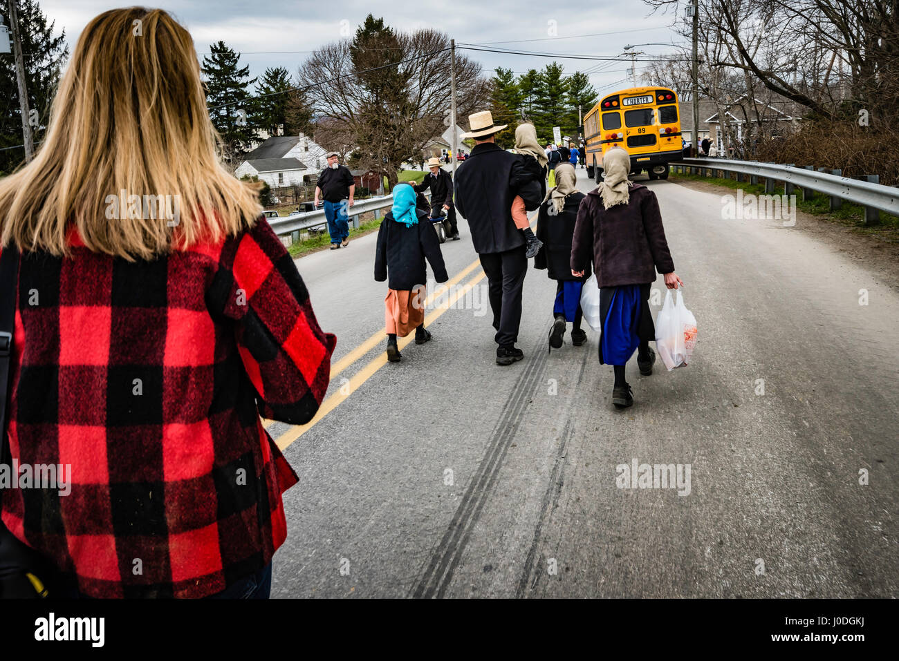 Amish Family leaving Mud Sale auction. Stock Photo