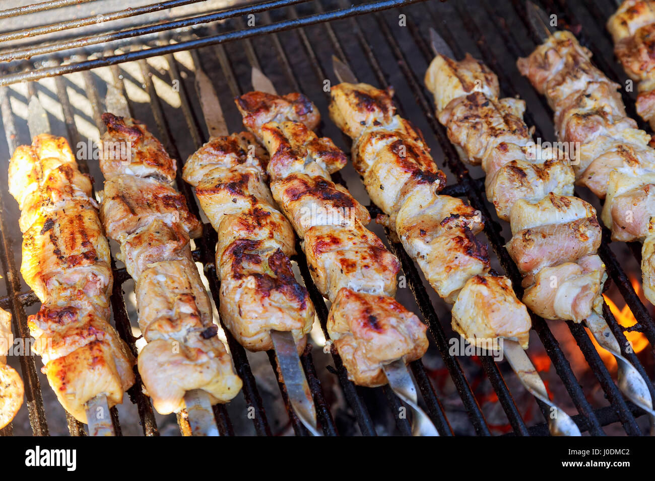 Grilled meats, hot pieces Barbecued Pork Kebab with meat skewers Stock Photo