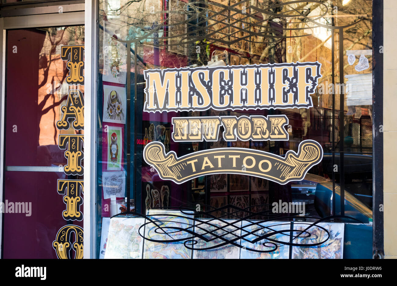 Mischief Tattoo parlor in Lower Manhattan Stock Photo