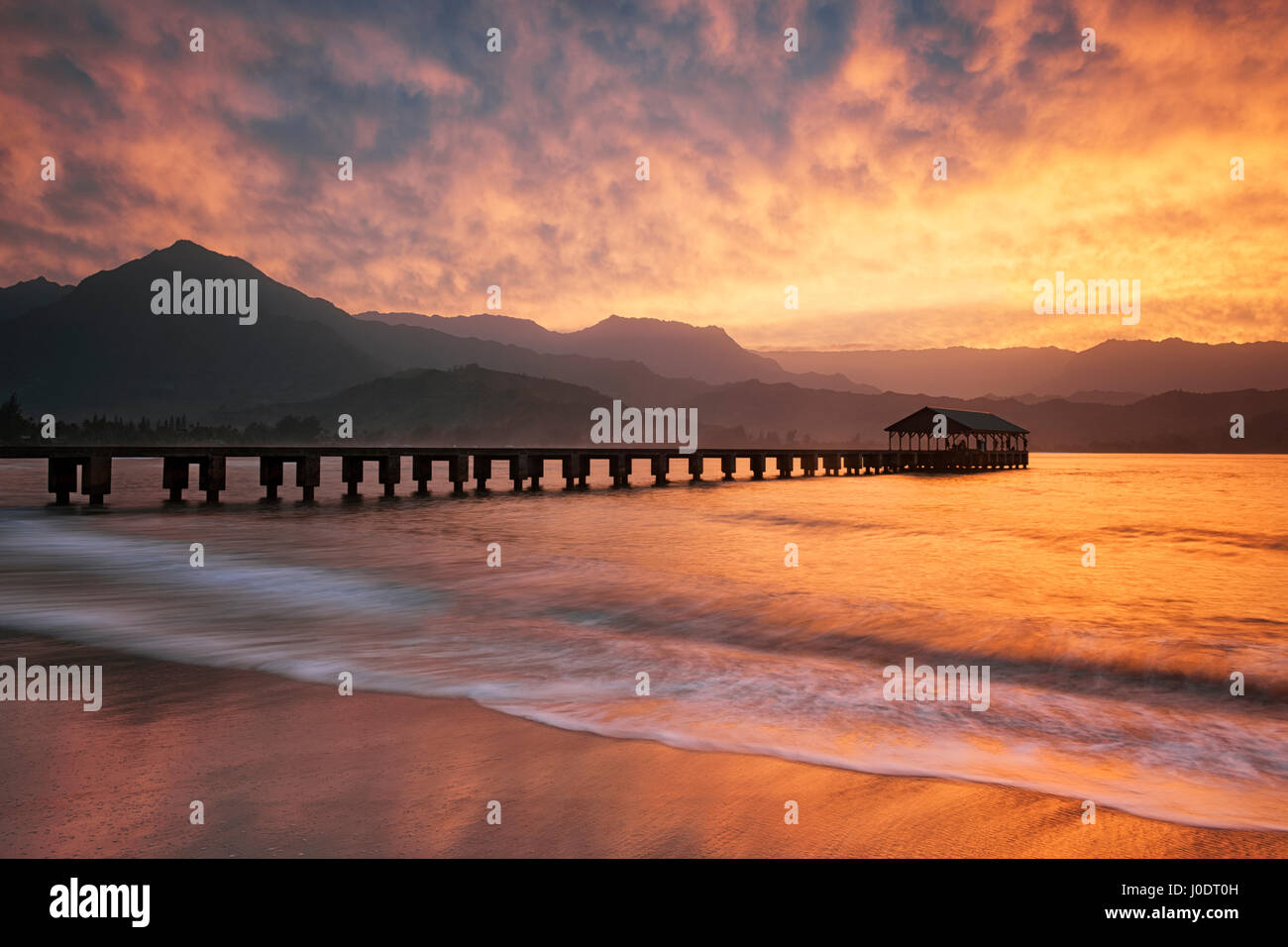 Spectacular sunset fills the sky over Hanalei Bay on Hawaii's Island of