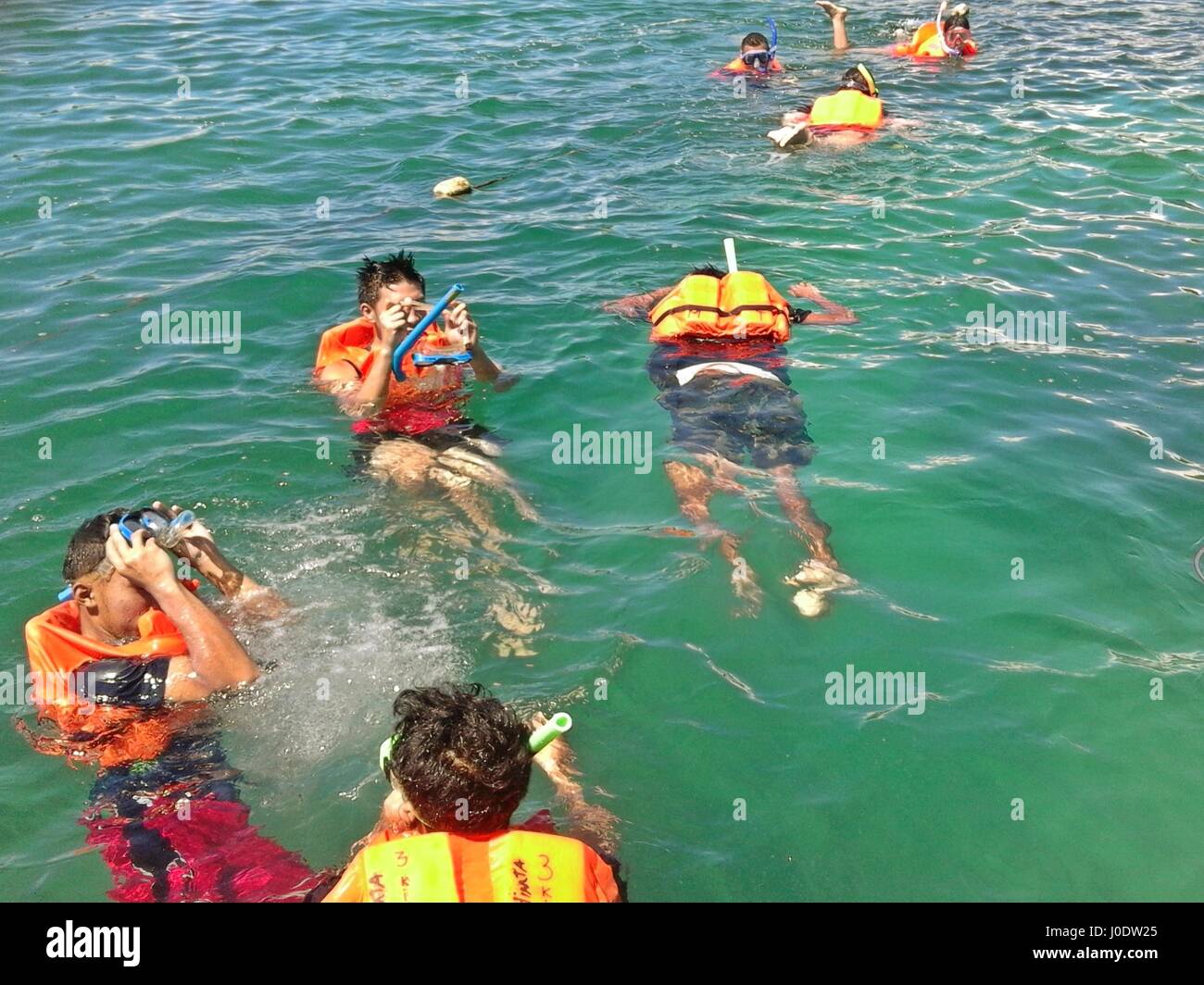 People snorkeling in a beach in Alaminos, Pangasinan, Philippines Stock