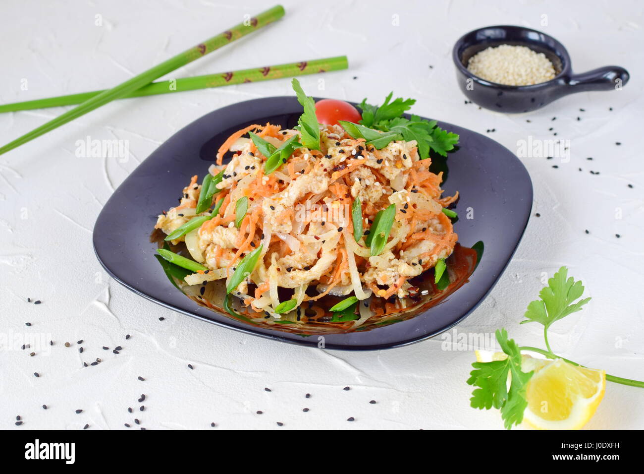 Korean traditional food. Raw chicken marinated with vegetables on a