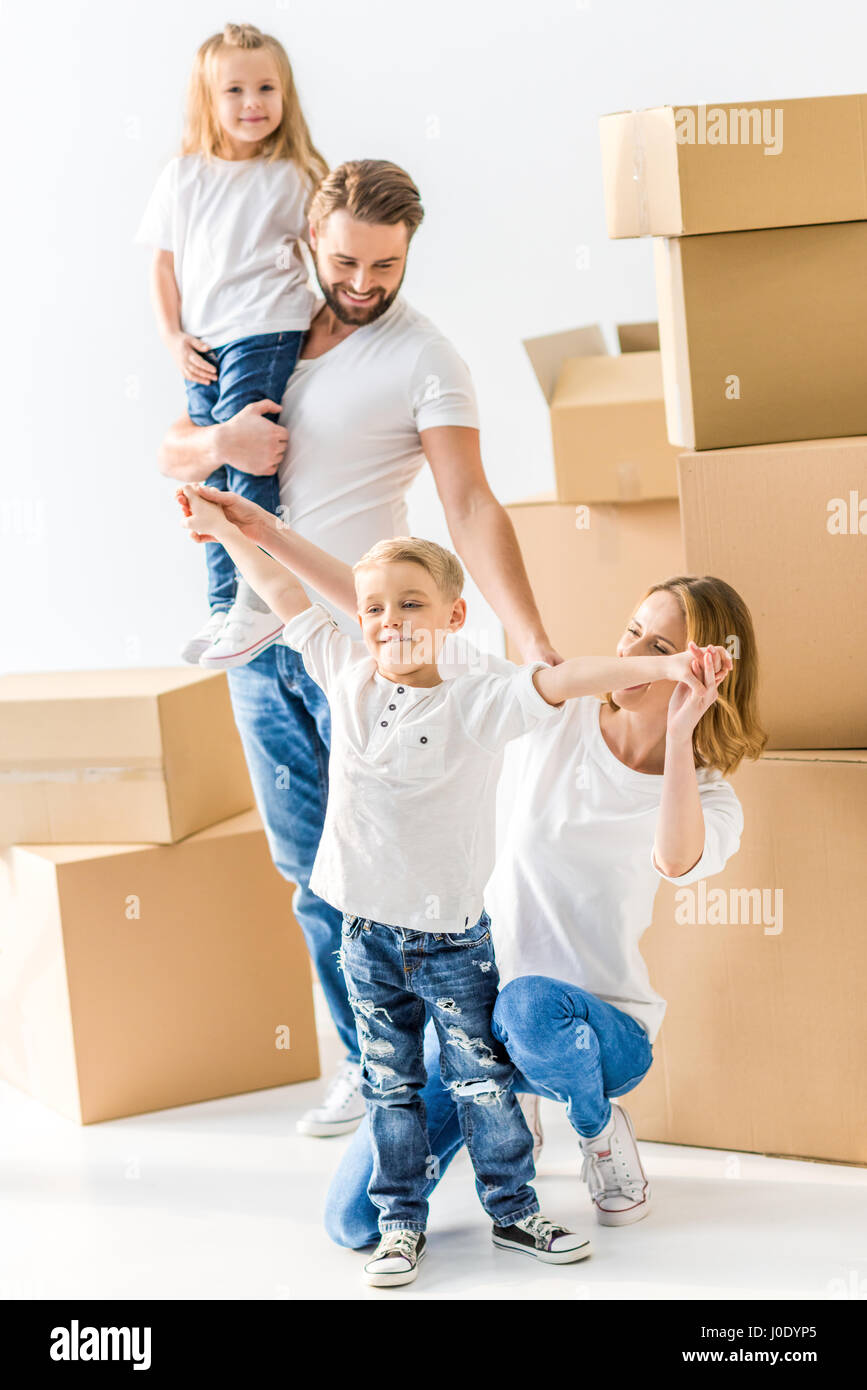 Young family of four hi-res stock photography and images - Alamy