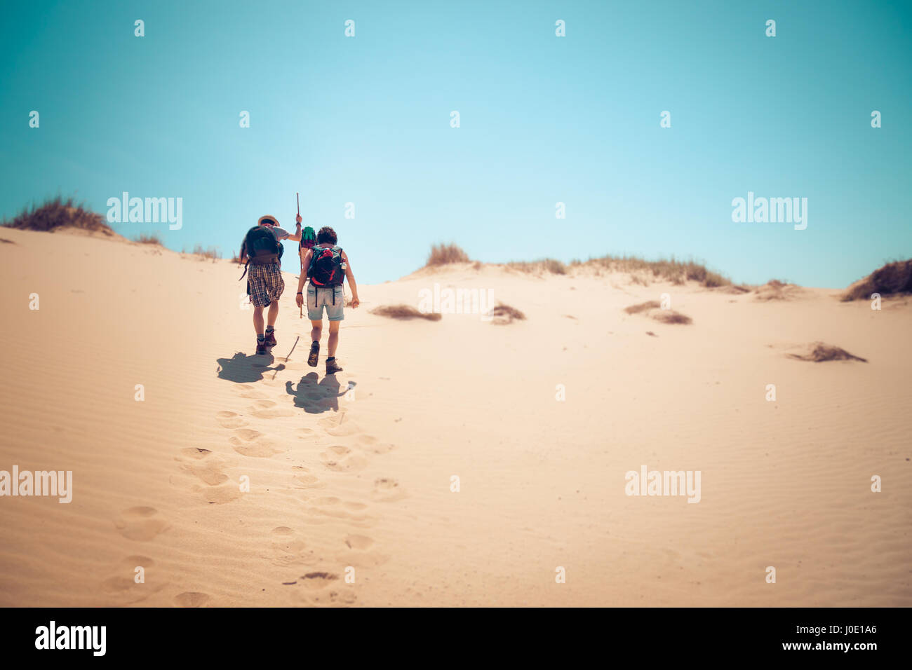 Two people walking uphill hi-res stock photography and images - Alamy