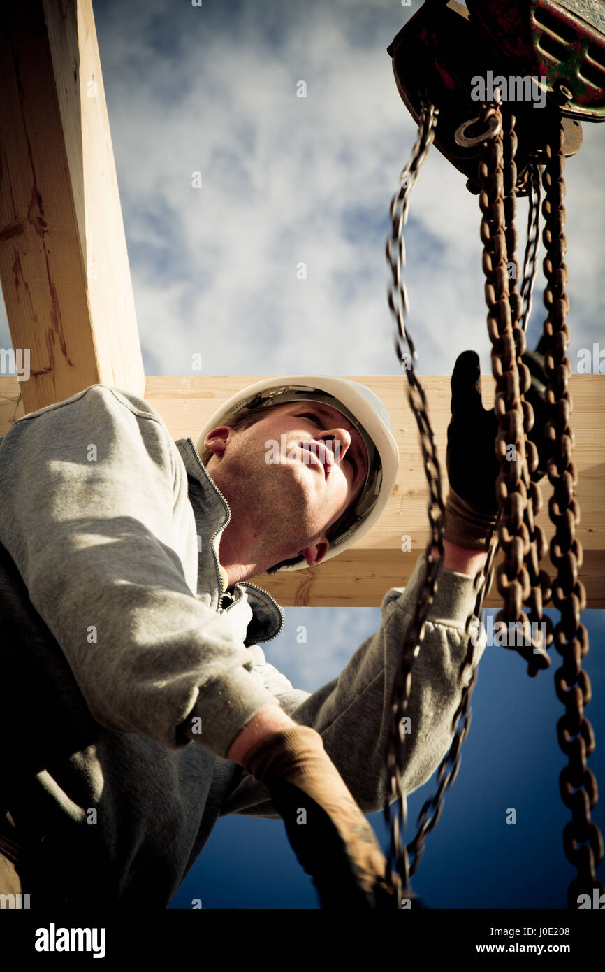 construction worker at work with winch Stock Photo Alamy