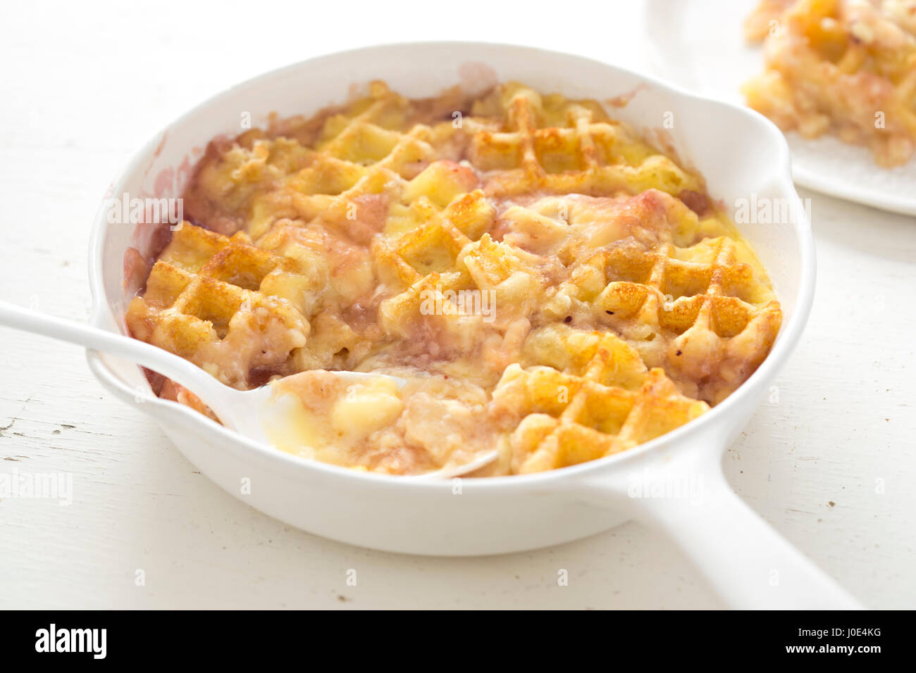 Belgian style waffle pudding with apple blueberry compote Stock Photo