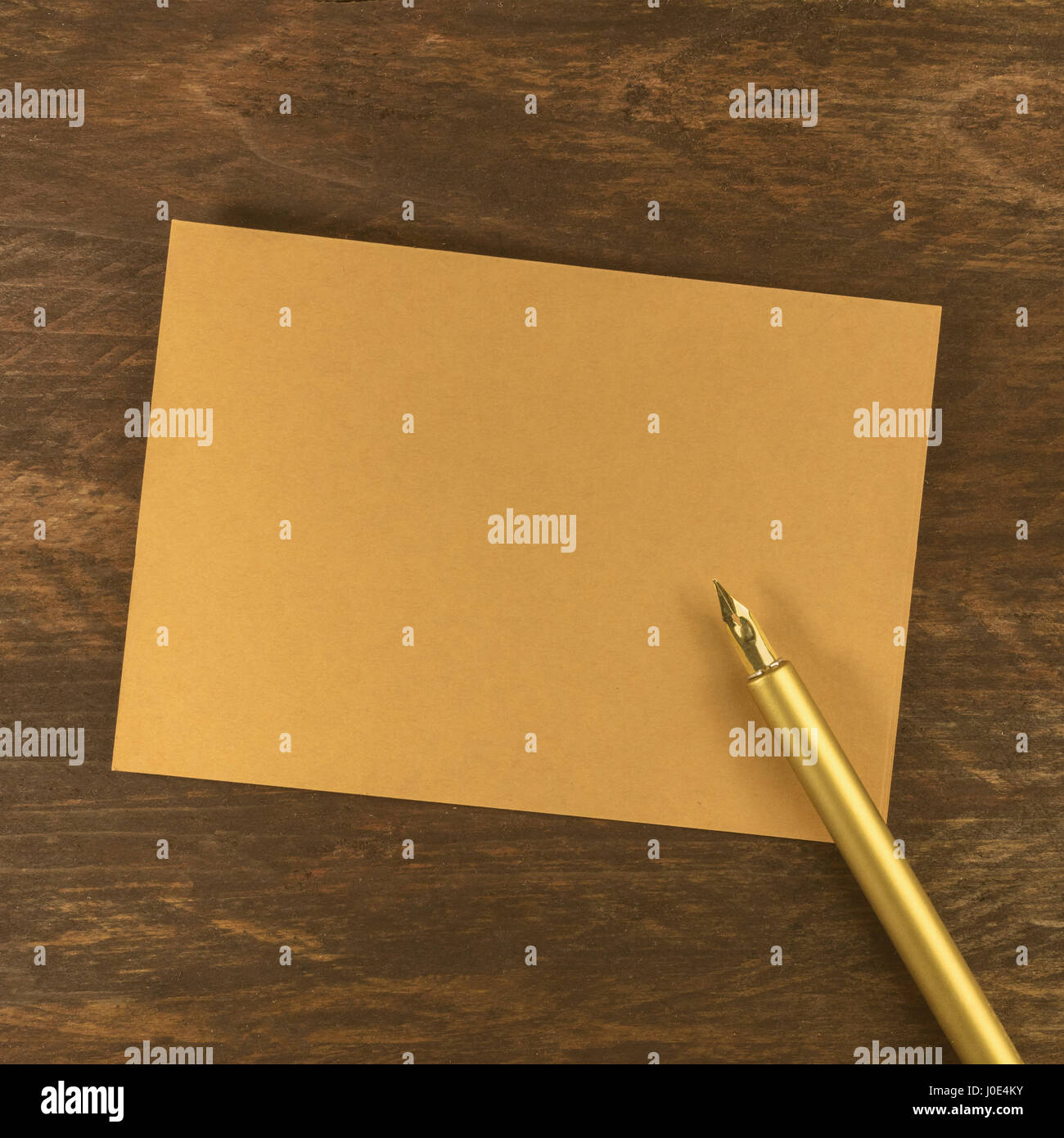 Brown kraft cardboard card with ink pen and copyspace Stock Photo Alamy