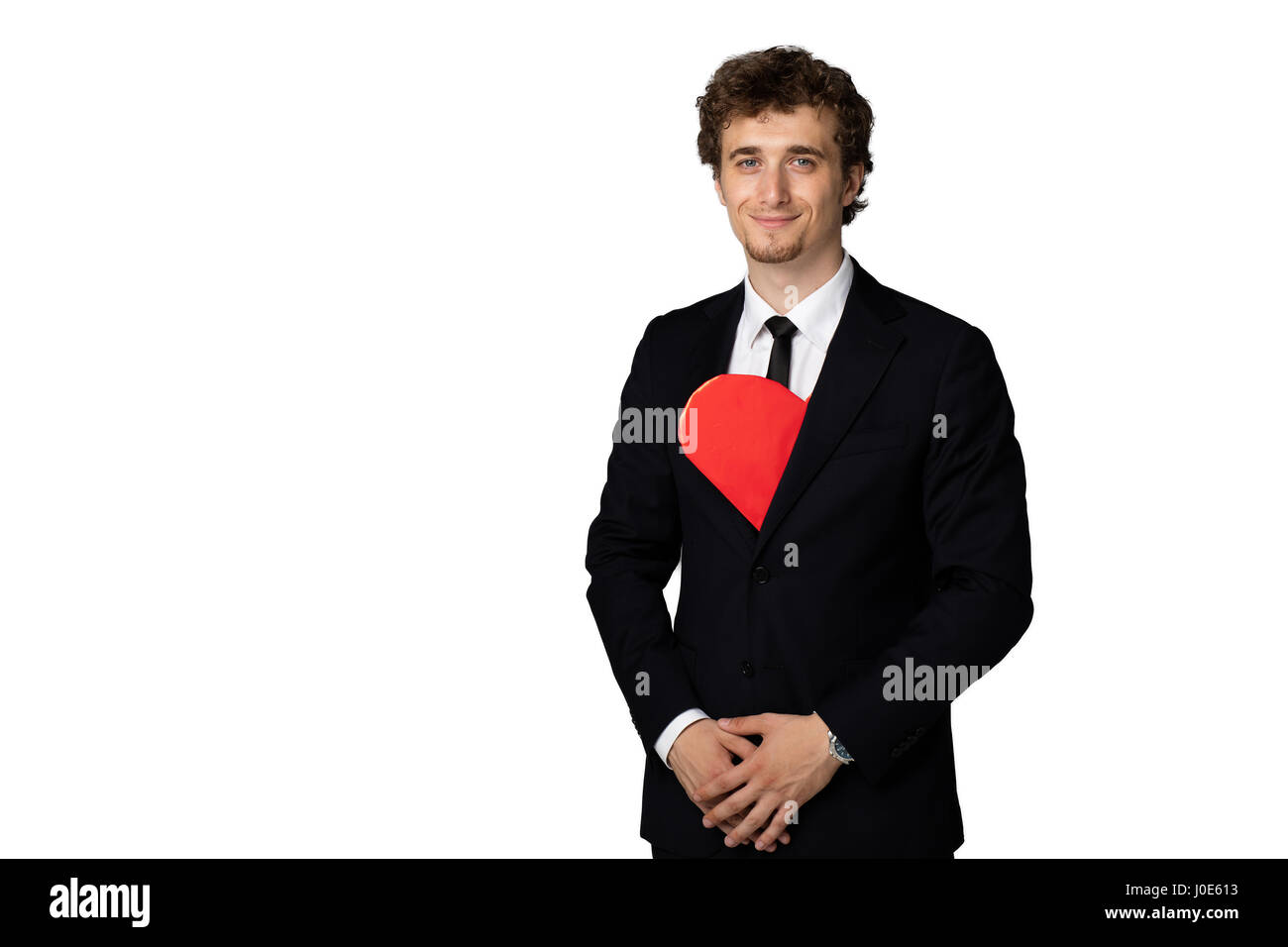 handsome elegant man in black suit having a red heart inside his suit ...
