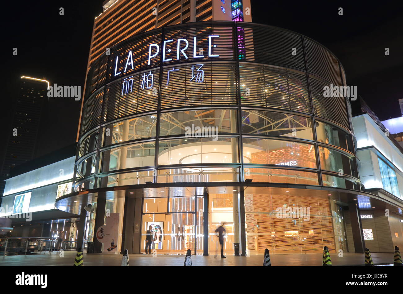People visit La Perle in Guangzhou China. La Perle is a contemporary shopping mall Stock Photo