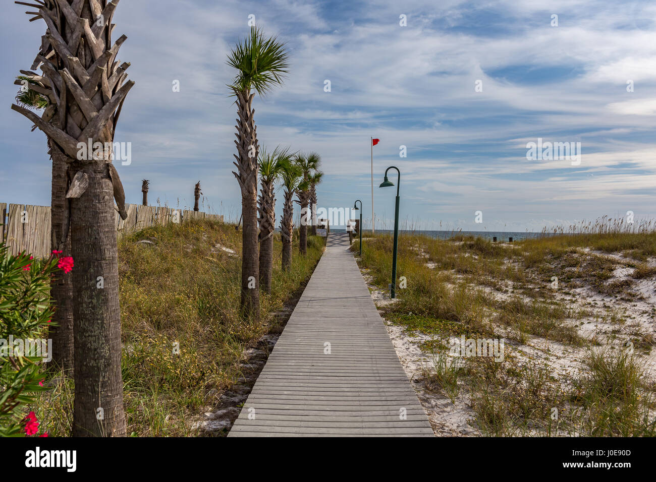 A boardwalk leads to a beach at the Gulf of Mexico at Destin, Florida. Stock Photo