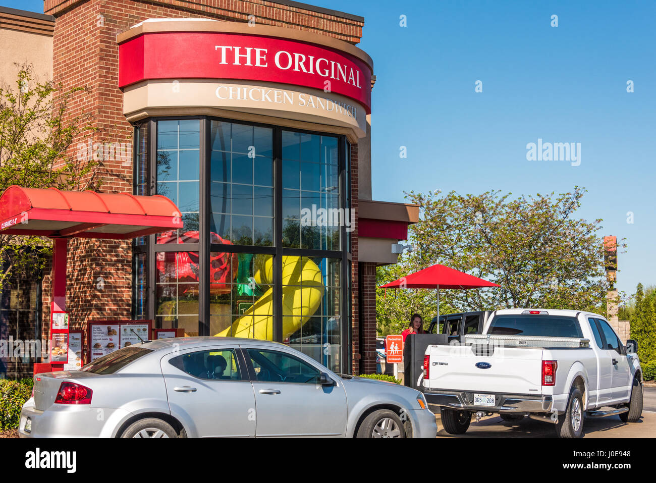 With drive-thru traffic wrapping the building, Olive Branch, Mississippi's popular Chick-fil-A restaurant delivers great food with fast service. Stock Photo