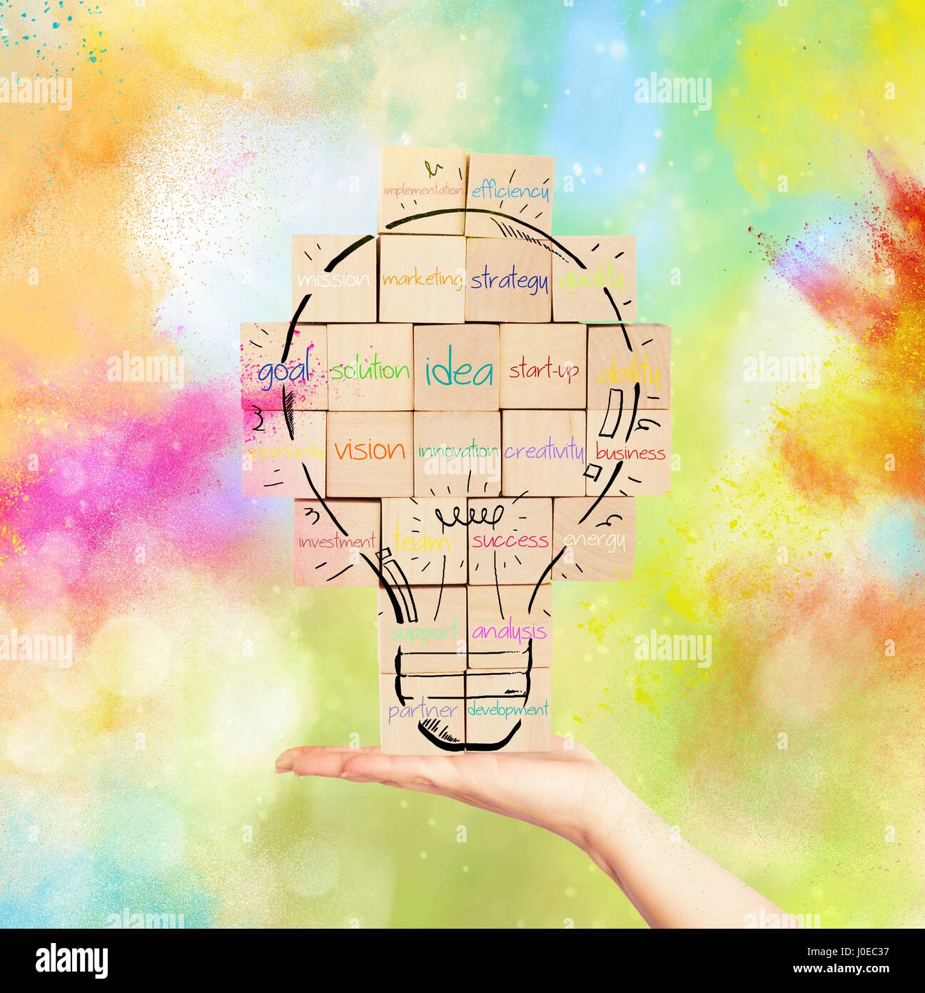 Building a new creative idea. brick wall with drawn lightbulb Stock Photo