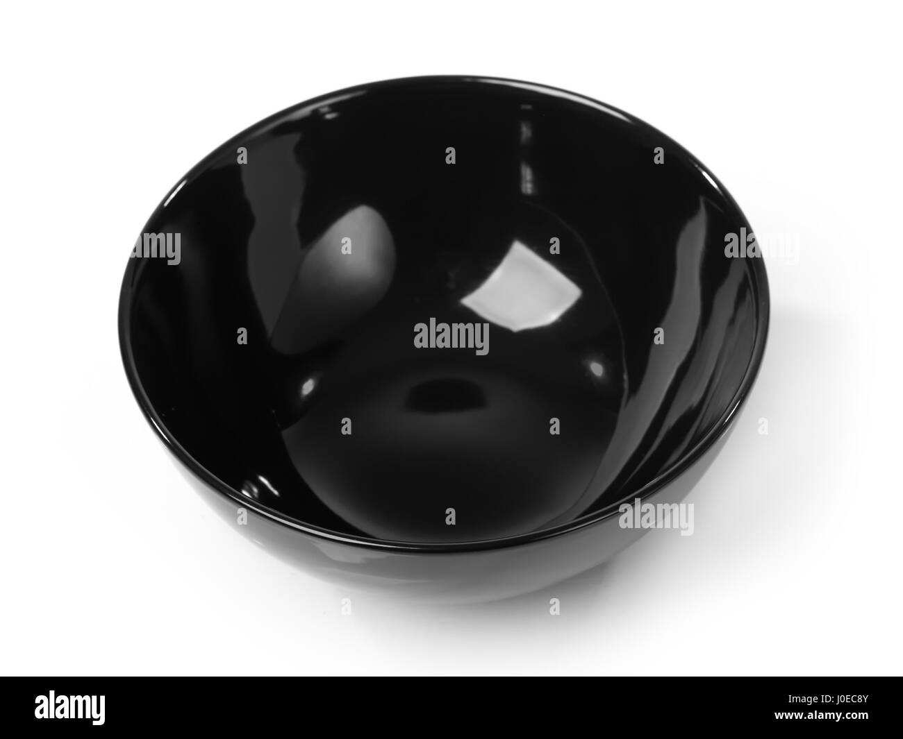 Empty black bowl isolated on white background Stock Photo Alamy