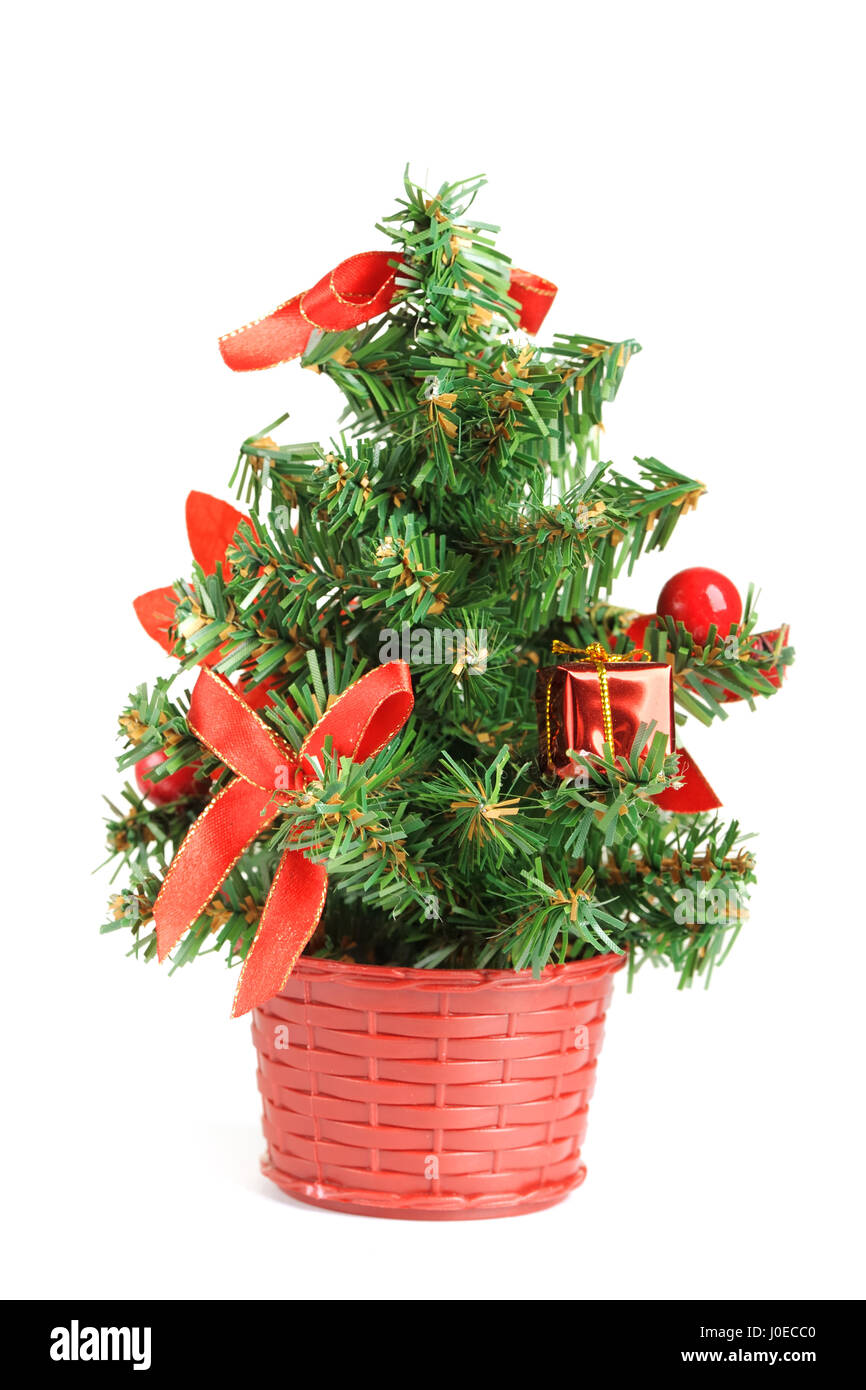 Small christmas tree isolated on white background Stock Photo - Alamy
